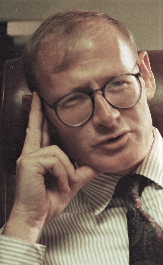 Man with glasses and a tie